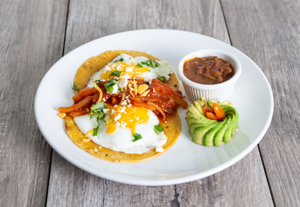 Huevos Rancheros dish at Crepeccino